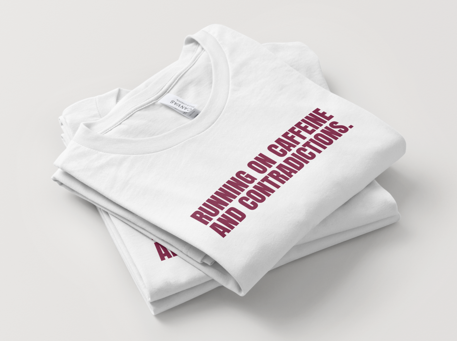 "Running on caffeine and contradictions." Classic Fit Tee